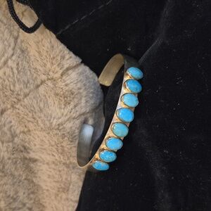 Silver bracelet with turquoise stones